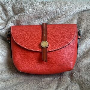 Dooney & Bourke Vibrant Orange Crossbody Bag and coordinated wallet by Fossil.